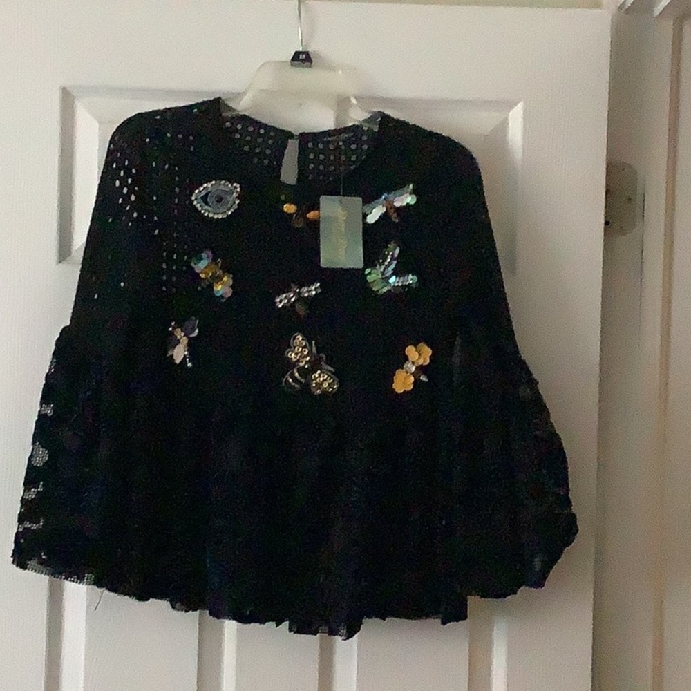 Dor Dor Couture. Black blouse size M.